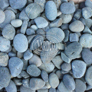 Mexican Black Beach Pebbles 1"-2" close up, perfect for adding a sleek and modern touch to landscaping and garden design