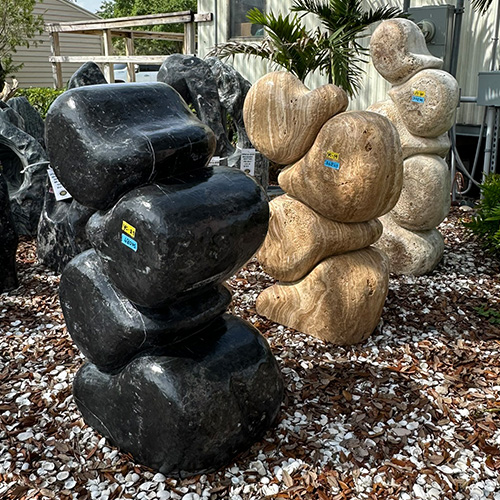 Variety of Abstract Stacked Sculptures in Different Colors by Yardco